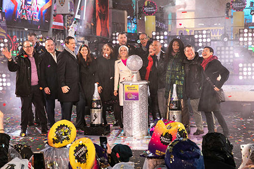 CPJ Executive Director Joel Simon, left, onstage with journalists in Times Square on New Year's Eve. (Times Square Alliance/Amy Hart)