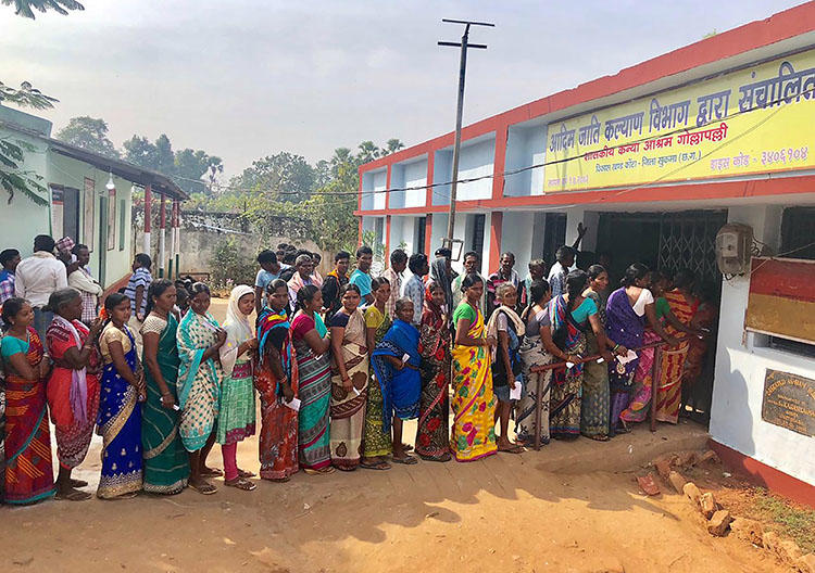 Voters line up at a polling station in Sukma in Chhattisgarh state on November 12, 2018. The state's newly elected state minister is setting up a committee to draft a journalist safety law. (AFP)