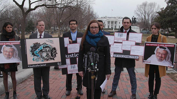 CPJ Advocacy Director Courtney Radsch, center, speaks in front of the White House on February 7 about CPJ's demands for justice for murdered Saudi journalist Jamal Khashoggi. (CPJ)