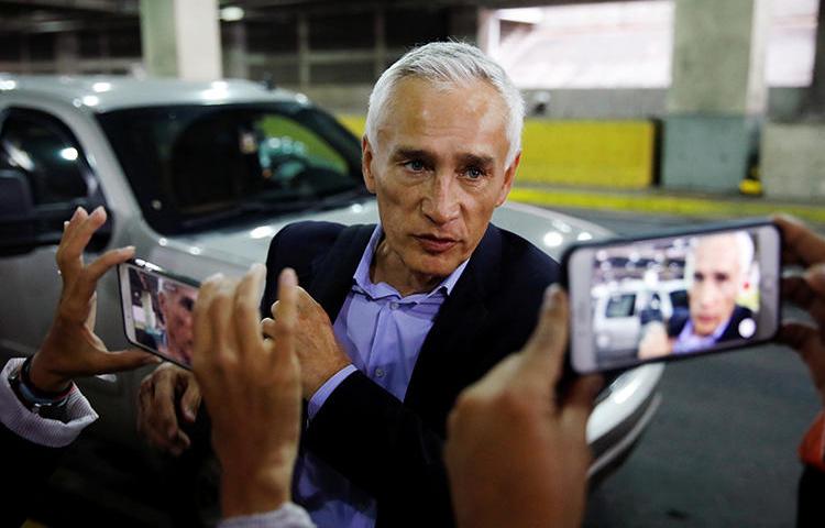 Jorge Ramos, anchor of Spanish-language U.S. television network Univision, talks to the media as he prepares to leave the country at the Simon Bolivar international airport in Caracas, Venezuela, on February 26, 2019. (Carlos Garcia Rawlins/Reuters)