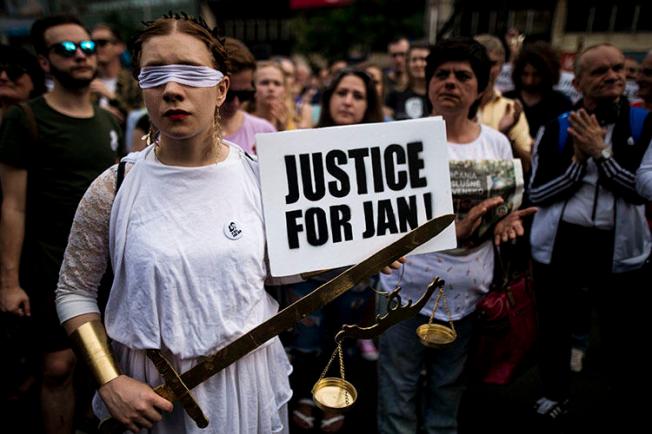 Demonstrators attend a protest in Bratislava, Slovakia, on May 4, 2018. Authorities have not identified the mastermind of the murders of journalist Jan Kuciak and his fiancee. (Vladimir Simicek/AFP)