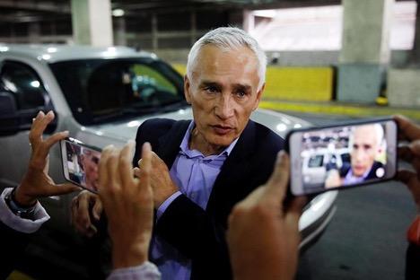 Jorge Ramos, anchor at Spanish-language U.S. television network Univision, talks to the media as he prepares to leave Venezuela at the Simon Bolivar international airport on February 26, 2019. (Carlos Garcia Rawlins/Reuters)
