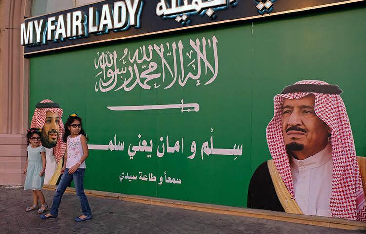 A poster of Saudi Arabia's King and Crown Prince, in Jeddah in November 2017. Medical assessments leaked to The Guardian reveal the abuse of detainees, including at least four journalists, in Saudi prisons. (Reuters/Reem Baeshen)