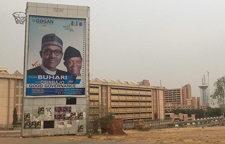 A billboard for Nigeria's incumbent president Muhammadu Buhari and his deputy, who won re-election in February. (CPJ/Jonathan Rozen)