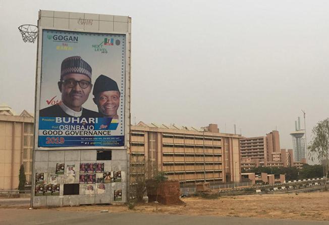 A billboard for Nigeria's incumbent president Muhammadu Buhari and his deputy, who won re-election in February. (CPJ/Jonathan Rozen)