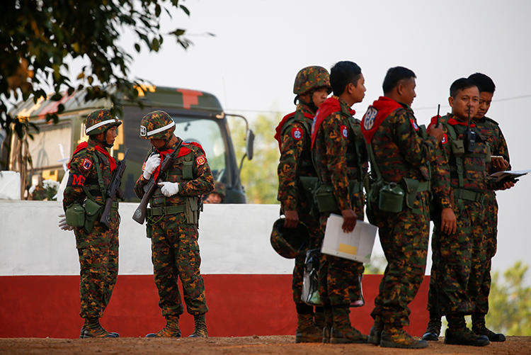 Soldiers are seen in the Ayeyarwaddy Delta region in Myanmar on February 2, 2018. The Myanmar military recently sued independent news outlet The Irrawaddy for defamation over its coverage. (Reuters/Lynn Bo Bo/Pool)