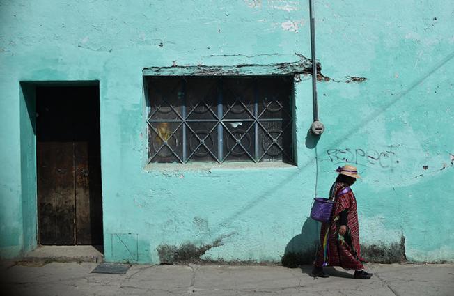 An indigenous woman walks in Tlaxiaco, Oaxaca state, on February 15, 2019. Telésforo Enríquez, the founder of a community radio station, was found shot dead in the town of San Agustín Loxicha, Oaxaca, on May 2. (AFP/Rodrigo Arangua)