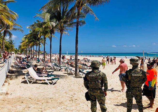 Mexican marines patrol the beach of Playacar, near the resort of Playa del Carmen, in Quintana Roo, in February 2019. Journalist Francisco Romero Díaz was shot dead in Playa del Carmen on May 16. (AFP/Daniel Slim)