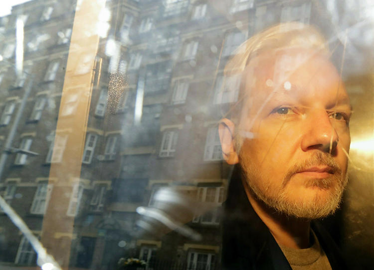 WikiLeaks founder Julian Assange is seen in London on May 1, 2019. Assange was recently indicted in the United States under the Espionage Act, the first such case conducted against a publisher. (AP/Matt Dunham)