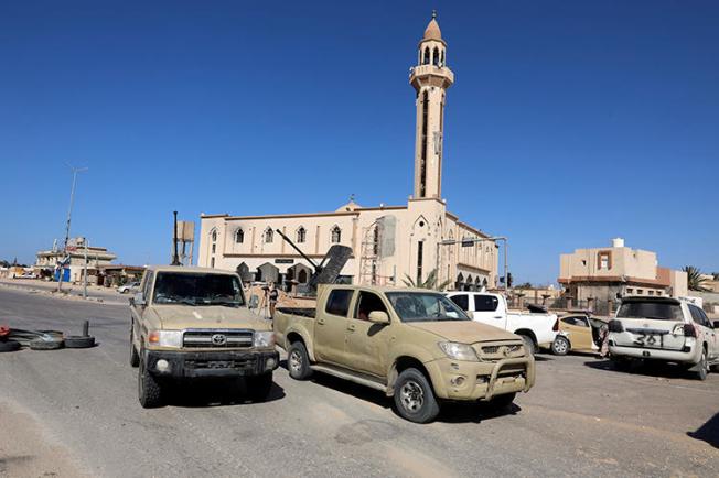 Military vehicles are seen in Salah al-Din, south of Tripoli, Libya, on May 7, 2019. Two Libyan journalists were recently abducted in Tripoli by forces affiliated with the Libyan National Army. (Reuters/Hani Amara)