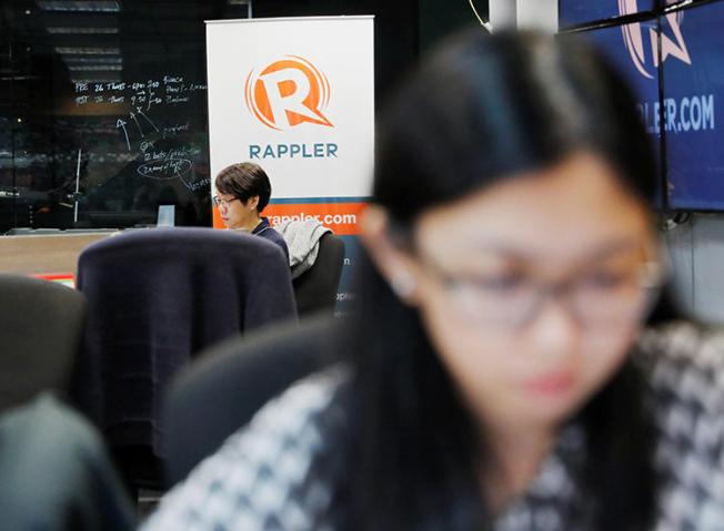 Journalists pictured in the Manila offices of Rappler, in January 2018. The outlet is one of four Philippine media groups smeared in a campaign that alleges they are in the pay of the CIA. (Reuters/Dondi Tawatao)