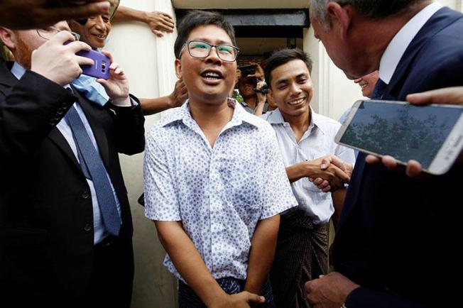 Reuters reporters Wa Lone and Kyaw Soe Oo, pictured as they are freed from prison in Yangon, Myanmar, on May 7 after receiving a presidential pardon. (Reuters/Ann Wang)