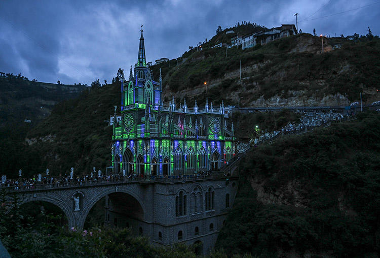 Lights illuminate the Roman Catholic church Las Lajas, in the Colombian department of Nariño in January 2019. A radio journalist in the region was shot dead on June 11. (AFP/Juan Barreto)