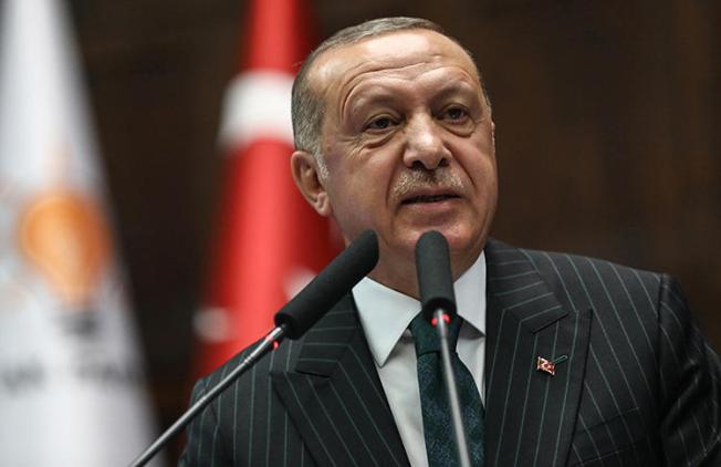 President Recep Tayyip Erdoğan speaks during a parliamentary group meeting at the Grand National Assembly of Turkey in Ankara on June 25, 2019. Two journalists are to stand trial, in separate cases, on charges of insulting the president. (AFP/Adem Altan)