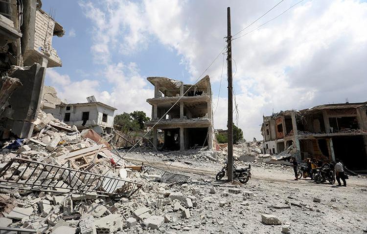 A damaged building is seen in Idlib, Syria, on June 14, 2019. Photojournalist Amjad Hassan Bakir was recently killed in an airstrike in Idlib. (AFP/Omar Haj Kadour)