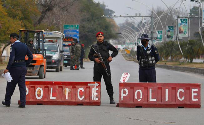 Pakistani police officers are seen in Islamabad on February 17, 2019. Journalist Muhammad Bilal Khan was recently stabbed to death in Islamabad. (AP/Anjum Naveed)