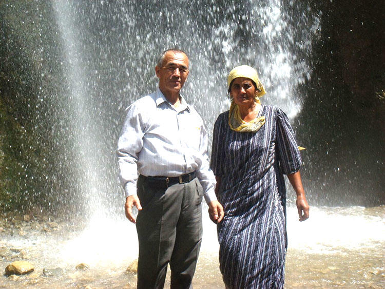 Kyrgyzstan journalist Azimjon Askarov and his wife, Khadicha, pictured during a family vacation in Arslanbob in the summer of 2009. 'This was Azimjon's last summer of freedom,' Khadicha told CPJ. (Askarov family)
