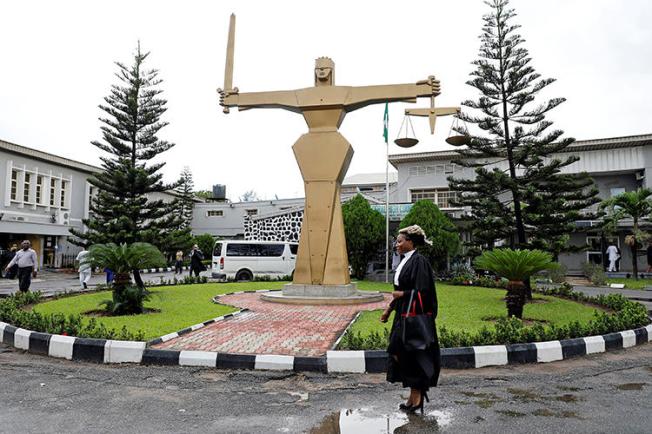 The Federal High Court in Lagos, Nigeria, is seen on May 8, 2018. Journalist Jones Abiri is set to attend a hearing at the high court in Abuja on cybercrime, anti-sabotage, and terrorism charges. (Reuters/Akintunde Akinleye)