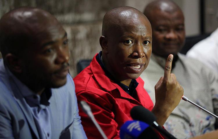 Julius Malema, leader of the opposition Economic Freedom Fighters (EFF) party, speaks during a media briefing at Parliament in Cape Town, South Africa, on February 12, 2018. The Johannesburg High Court ruled on June 6, 2019, that Malema and the EFF violated the Electoral Act by doxxing Karima Brown in March. (Reuters/Sumaya Hisham)