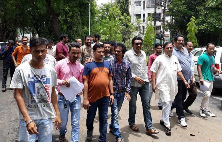 Harshad Ahir (second from left) and fellow journalists march in Valsad, Gujarat, after the journalist was attached on June 6, 2019. (Image via Harshad Ahir)