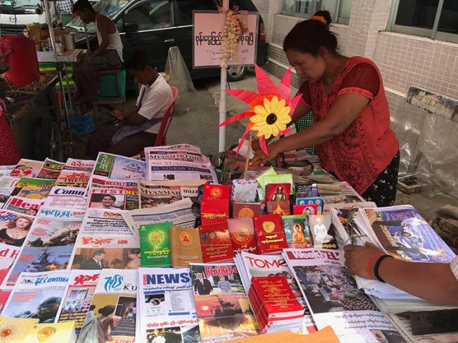 A market stall sells newspapers in Yangon, in June 2019. Journalists in Myanmar say their reporting is still met with legal action and censorship. (CPJ/Shawn Crispin)