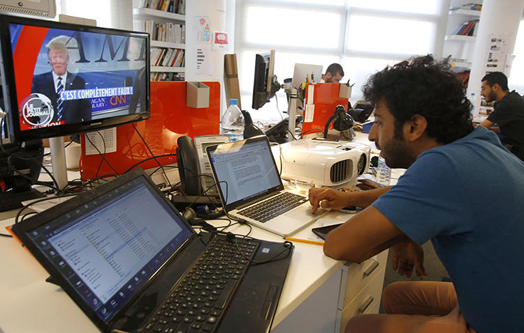 Moroccan investigative journalist Omar Radi, who at the time worked for the website Le Desk, the website's headquarters in Casablanca, Morocco, on September 18, 2015. Radi and other independent journalists told CPJ about a climate of pervasive surveillance and harassment in the country. (AP Photo/Abdeljalil Bounhar)