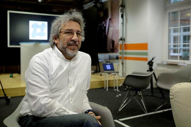 Can Dündar, the former editor-in-chief of Cumhuriyet newspaper pictured on April 7, 2017, now runs nonprofit online radio station 'Ozguruz' from exile in Germany. (AP/Markus Schreiber)