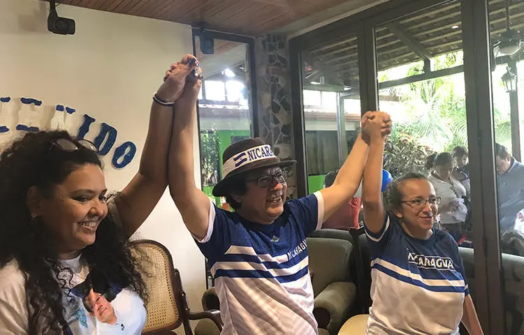 Verónica Chávez, Miguel Mora, and Lucia Pineda, after Mora and Pineda's release from prison June 11, in Managua, Nicaragua. (CPJ)
