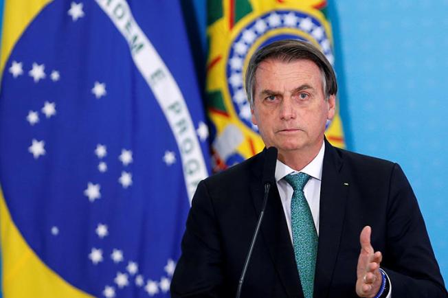 O presidente brasileiro, Jair Bolsonaro, é visto em Brasília em 24 de julho de 2019. Recentemente, advertiu que o jornalista Glenn Greenwald poderia enfrentar pena de prisão no Brasil. (Reuters/Adriano Machado)