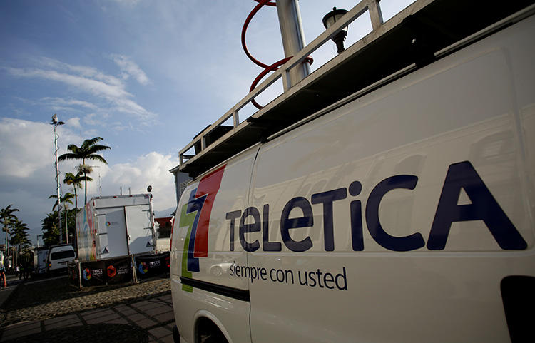 A mobile television unit from Teletica broadcasts the last state of the nation address by Costa Rica's President Luis Guillermo Solis at the Congress in San Jose, Costa Rica, on May 2, 2018. An explosive was detonated outside Teletica's office in San Jose on July 27, 2019. (Reuters/Juan Carlos Ulate)