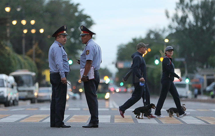Police officers are seen in Almaty, Kazakhstan, on June 12, 2019. A group of journalists were recently attacked at a press conference in Almaty. (Reuters/Pavel Mikheyev)