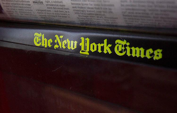 The New York Times logo is seen on a newspaper rack at a convenience store in Washington, D.C., on August 6, 2019. CPJ and RCFP filed a lawsuit on August 8 seeking documents in a leak investigation involving a Times reporter. (AFP/Alastair Pike)