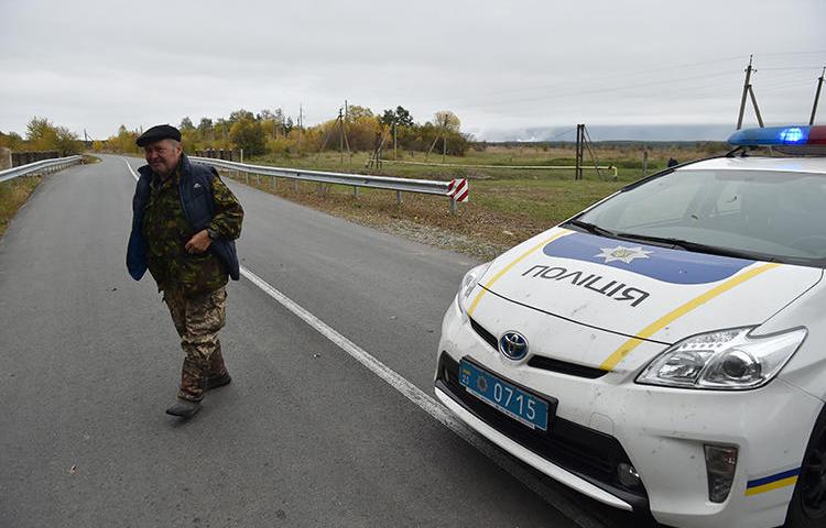 A police car is seen in Chernihiv, Ukraine, on October 9, 2018. Blogger Igor Stakh was recently assaulted in Chernihiv. (AFP/Genya Savilov)
