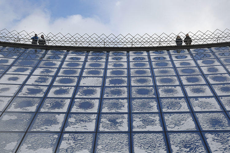People look across at the city central square from the mall viewing platform covered with snow in Kiev, in January 2019. A court in the city on August 6 ruled against Hromadske TV in a case over the outlet's tweet about a nationalist group. (AP/Efrem Lukatsky)