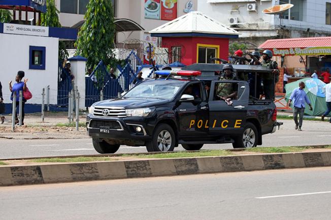 Police are seen in Abuja, Nigeria, on July 23, 2019. Nigerian publisher Agba Jalingo has been detained since August 22 without charge. (Reuters/Afolabi Sotunde)