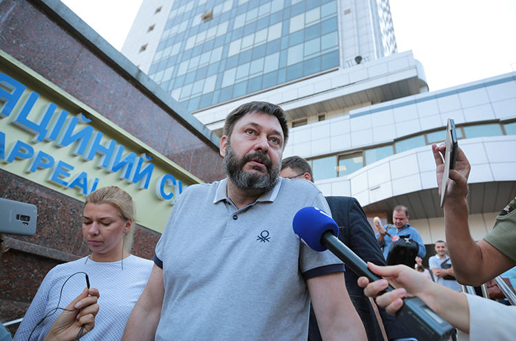 Kirill Vyshinsky, director of the Ukrainian office of the Russian state news agency RIA Novosti, talks to the media after a court ordered his release on bail, in Kyiv, Ukraine August 28, 2019. (Reuters/Serhii Nuzhnenko)