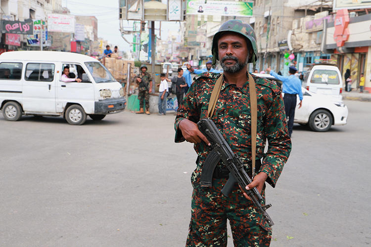 A police officer is seen in Hodeidah, Yemen, on February 13, 2019. Military police recently arrested and released three journalists in Taiz. (Reuters/Abduljabbar Zeyad)