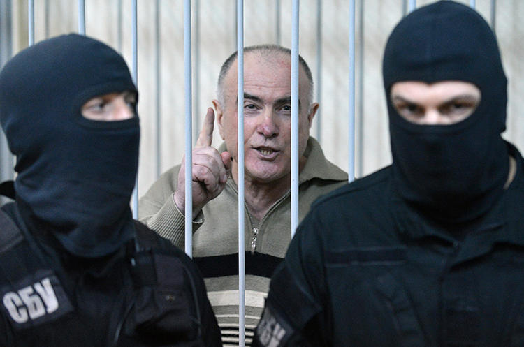 Aleksei Pukach is seen at a Kiev district court on January 29, 2013. Pukach was convicted in the 2000 murder of journalist Georgy Gongadze, and is now appealing his life sentence. (AFP/Sergei Supinsky)