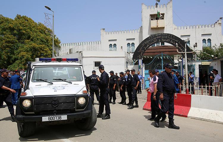 Police officers are seen at El Harrach prison in Algiers, Algeria, on June 13, 2019. Freelance journalist Sofiane Merakchi was recently sent to the prison for pre-trial detention. (Reuters/Ramzi Boudina)