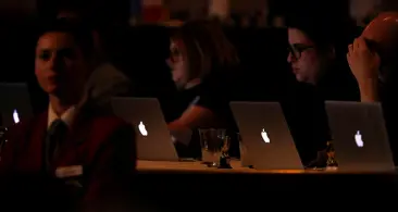 Reporters work during a panel for a television series in Beverly Hills, California, in August 2016. Female and gender non-conforming journalists in the U.S. and Canada say there is a need for greater training on dealing with harassment and threats. (Reuters/Mario Anzuoni)