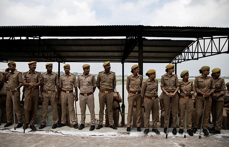 Police are seen in Unnao, Uttar Pradesh, India, on July 31, 2019. Police in Uttar Pradesh recently arrested, investigated, and filed complaints against several journalists. (Reuters/Danish Siddiqui)