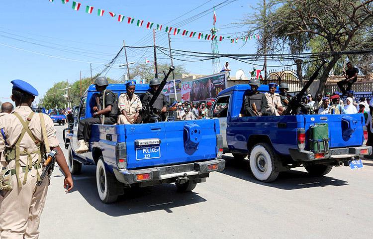Police are seen in Hargeisa, Somaliland, on May 18, 2015. Hargeisa police recently arrested two employees of HadhwanaagNews after a court ordered the outlet's website to be blocked. (Reuters/Feisal Omar)