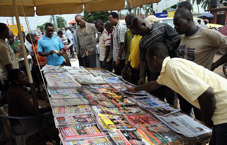 A roadside news stand in Asaba, Delta State, in April 2011. A court in Asaba has charged two journalists with criminal defamation. (AFP/ Pius Utomi Ekpei)