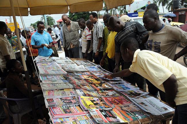 A roadside news stand in Asaba, Delta State, in April 2011. A court in Asaba has charged two journalists with criminal defamation. (AFP/ Pius Utomi Ekpei)