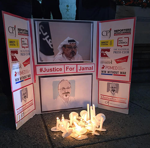 CPJ hosts a candlelight vigil outside the Saudi embassy in Washington, D.C., on October 2, the one-year anniversary of the murder of Jamal Khashoggi. (CPJ/Justin Shilad)