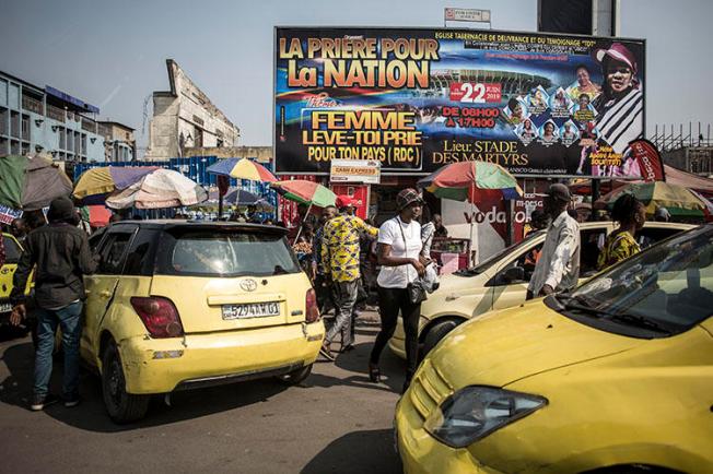 Taxis in Kinshasa in June 2019. Police in the Democratic Republic of Congo capital detained a journalist for five days over a criminal defamation complaint. (AFP/John Wessels)