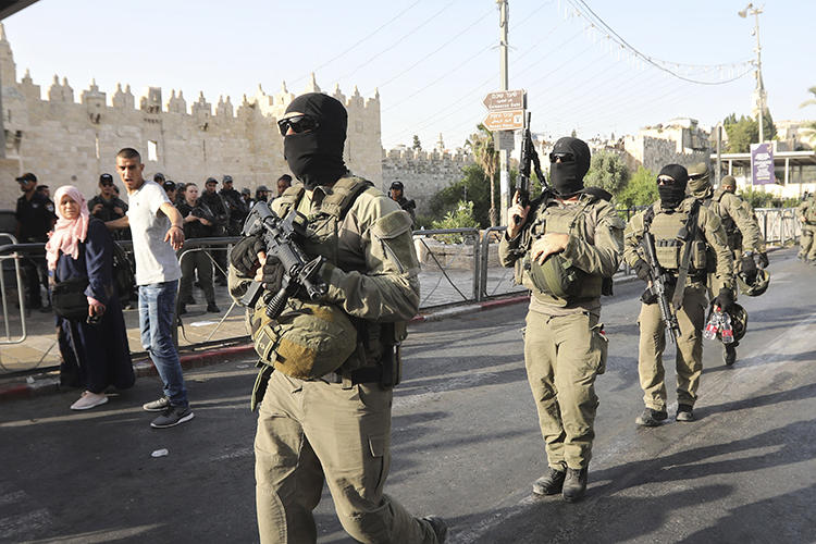 Israeli police are seen in Jerusalem's Old City on May 31, 2019. Israeli police recently raided the offices of Palestine TV and a local production company in Jerusalem. (AP/Mahmoud Illean)