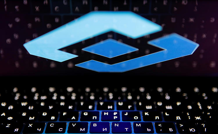 The logo of Russia's state communications regulator, Roskomnadzor, is reflected in a laptop screen in February 2019. Research by Censored Planet shows how Russia has imposed its censorship model in the past seven years. (Reuters/Maxim Shemetov)