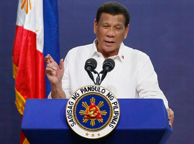 Philippine President Rodrigo Duterte is seen in Quezon City on August 27, 2019. Duterte recently threatened to block the franchise renewal of Philippine broadcaster ABS-CBN. (AP/Bullit Marquez)