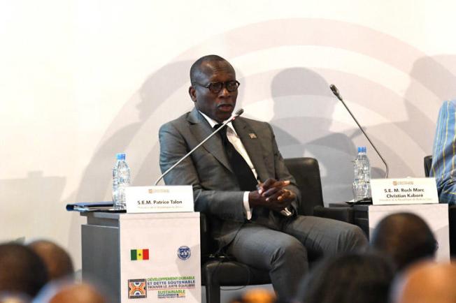 Patrice Talon, the president of Benin, during a conference co-organized by the International Monetary Fund (IMF) on sustainable development and debt in Diamniadio, Senegal, on December 2, 2019. Authorities in Benin on December 20 arrested journalist Ignace Sossou on a defamation complaint filed by a government minister. (AFP/Seyllou)